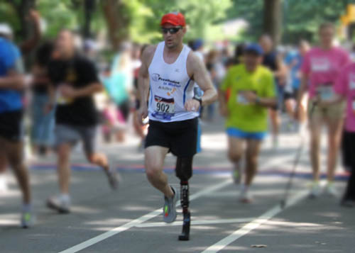 An Above the Knee Amputee runs at the Achilles International Hope and Possibilities Run